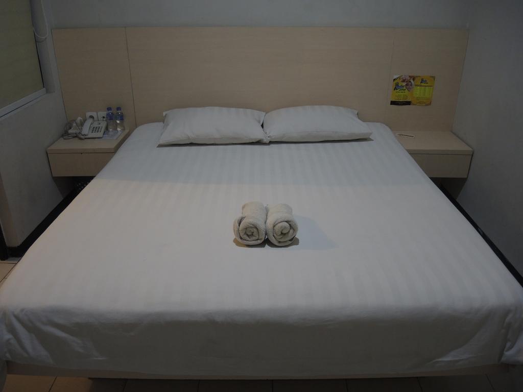 Swk 95 Hotel Surabaja Pokoj fotografie